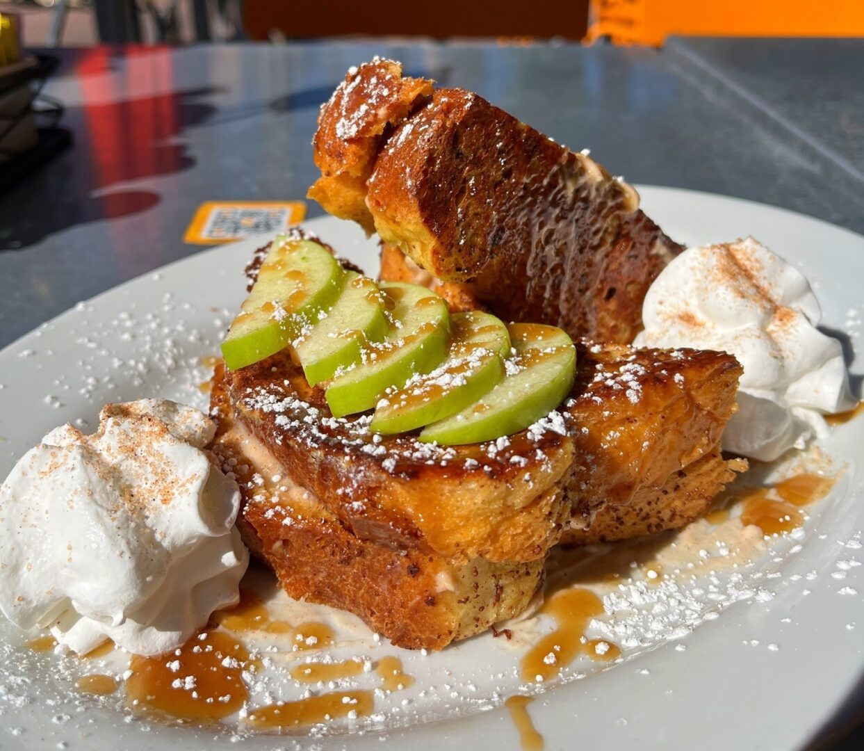 Caramel apple stuffed French toast on a plate