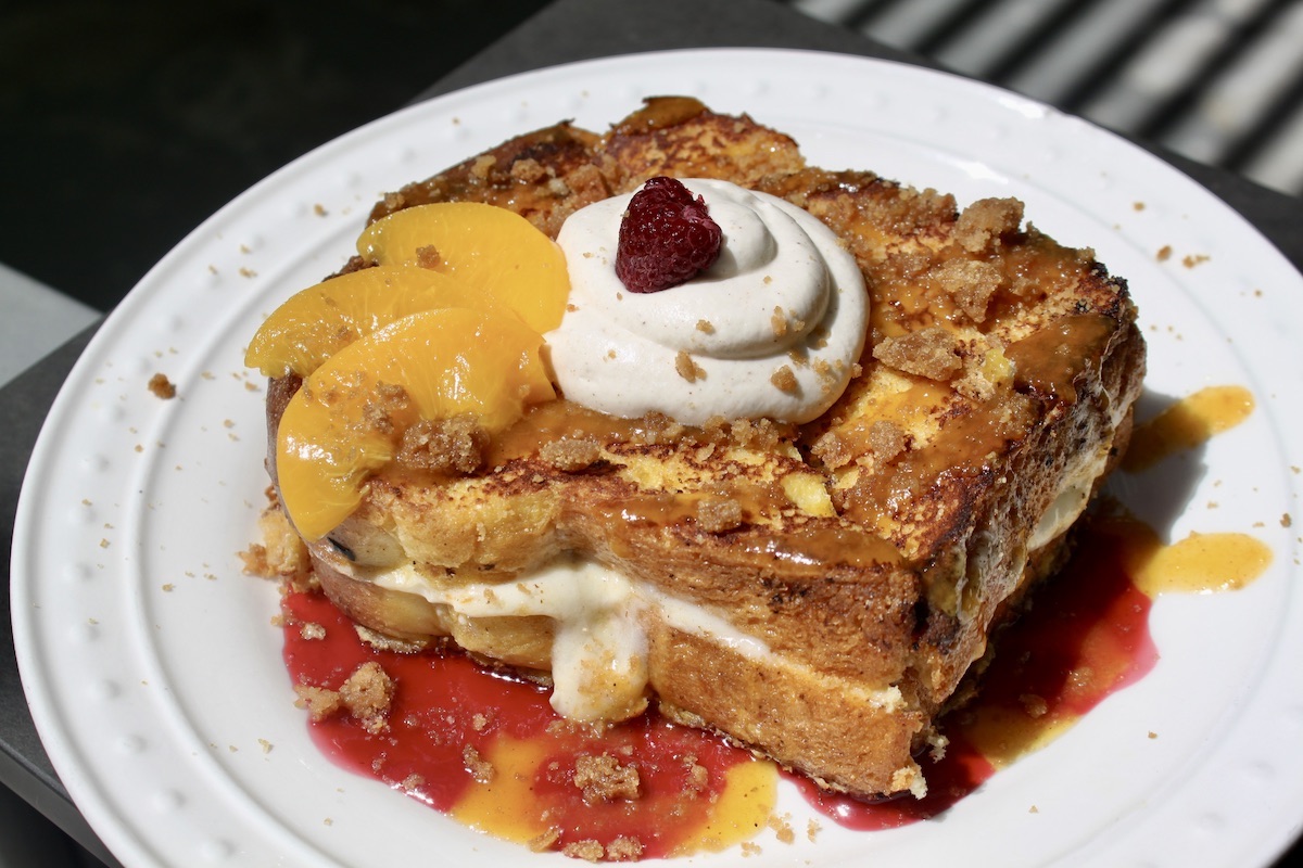 Peach Cobbler Stuffed French Toast on a plate.